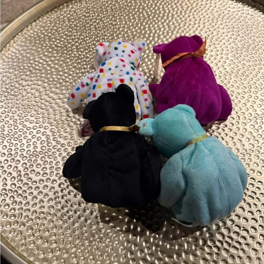 Ty Beanie Babies with tags ( Ariel, The End, y2k, and millennium beanie baby)